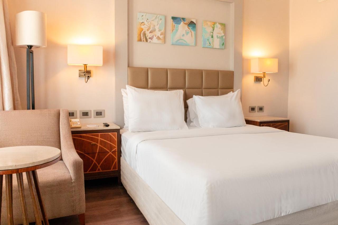 Sharm Dreams Vacation Club - Aqua Park Hotel Ngoại thất bức ảnh A bedroom at the hotel